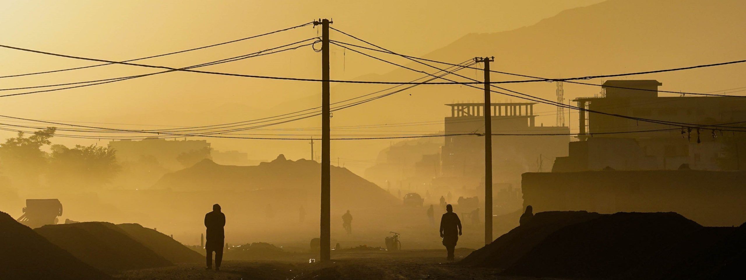 sunset lighting over dusty city