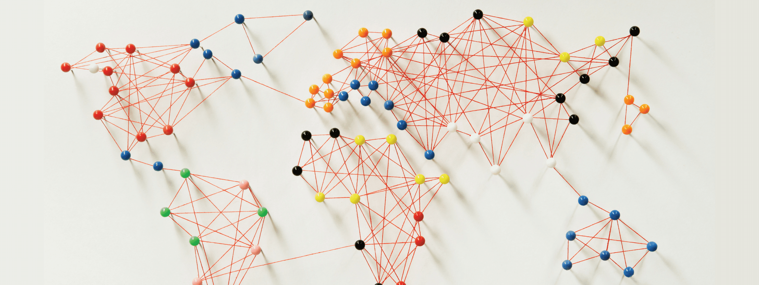 continents drawn with string and push pins