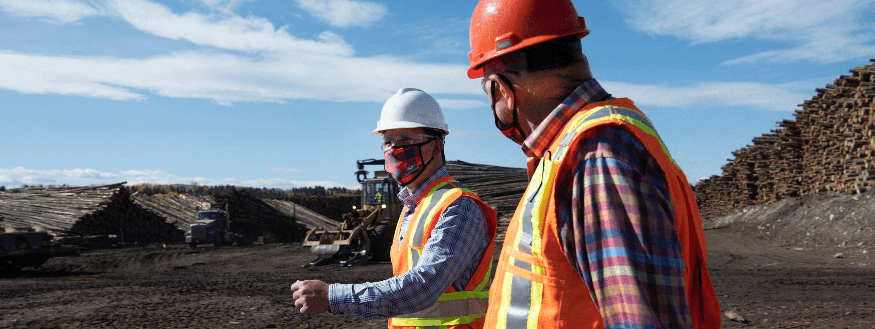 two construction workers outside