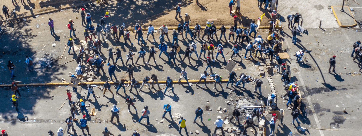 people rioting in the street