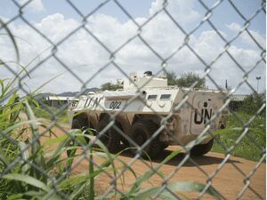 UN tank behind a fence