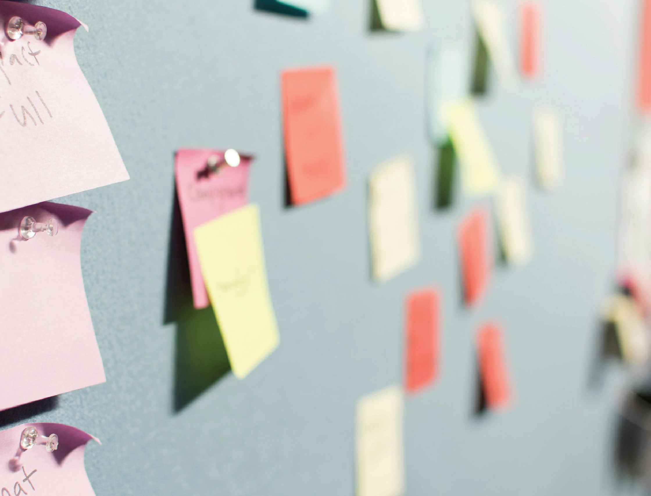 Colorful post-its on a wall.