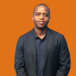 Headshot of a person wearing a black shirt against an orange background