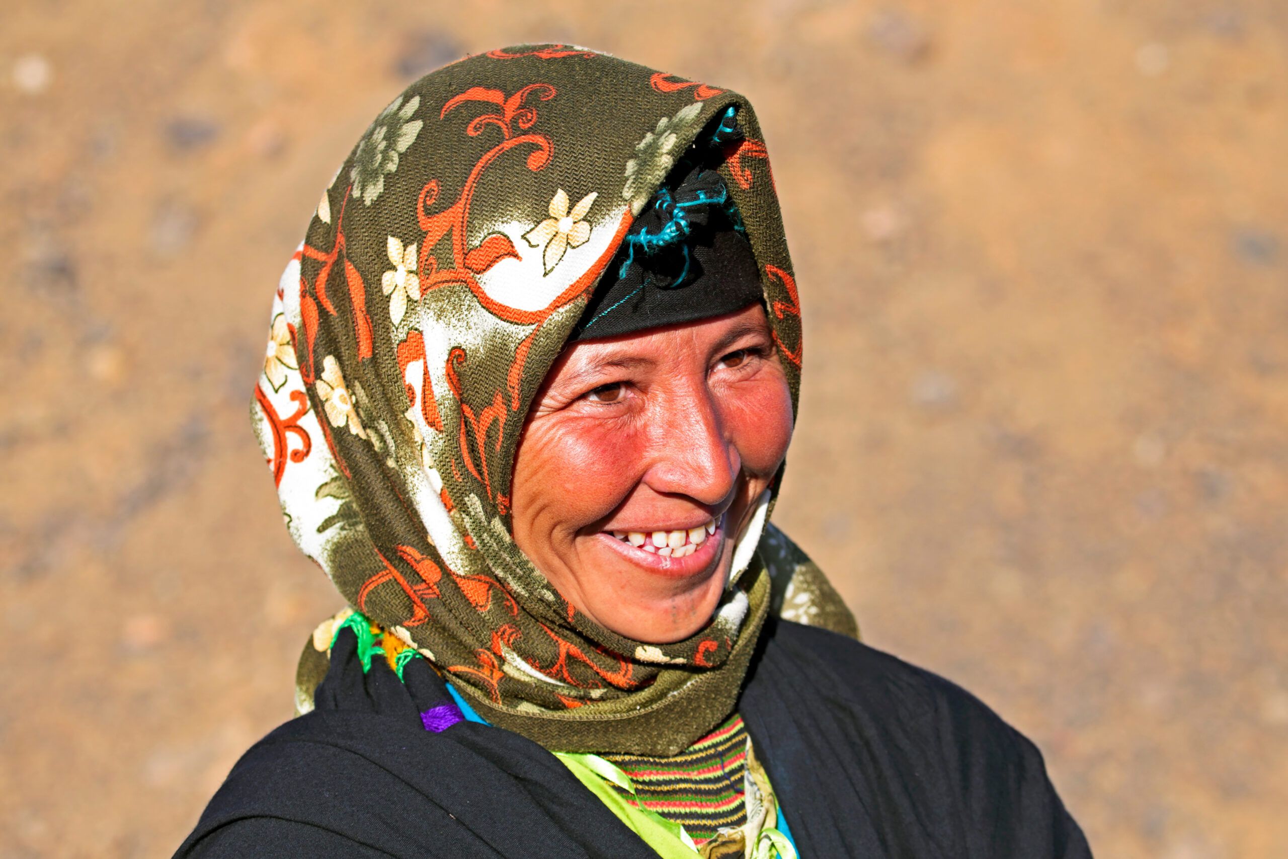 Young nomad person in the desert with headscarf