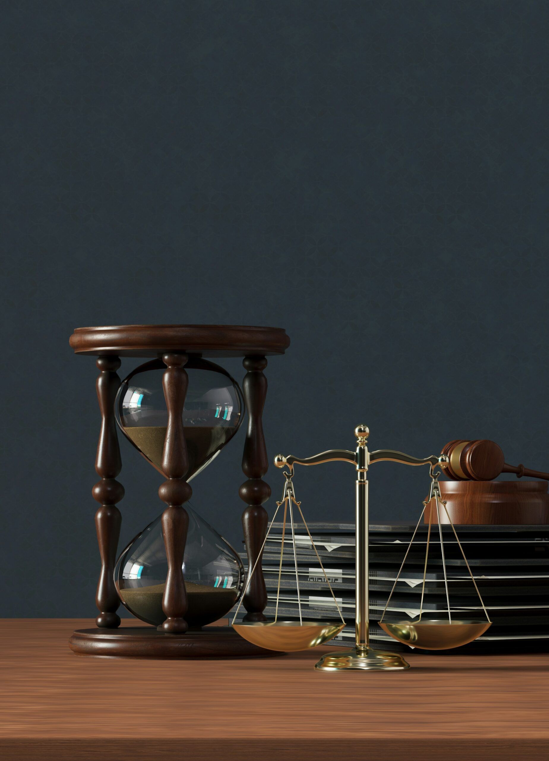 Planet Volume, “A wooden table topped with an hourglass and a scale,” Unsplash, October 25, 2023. © License via Unsplash+.