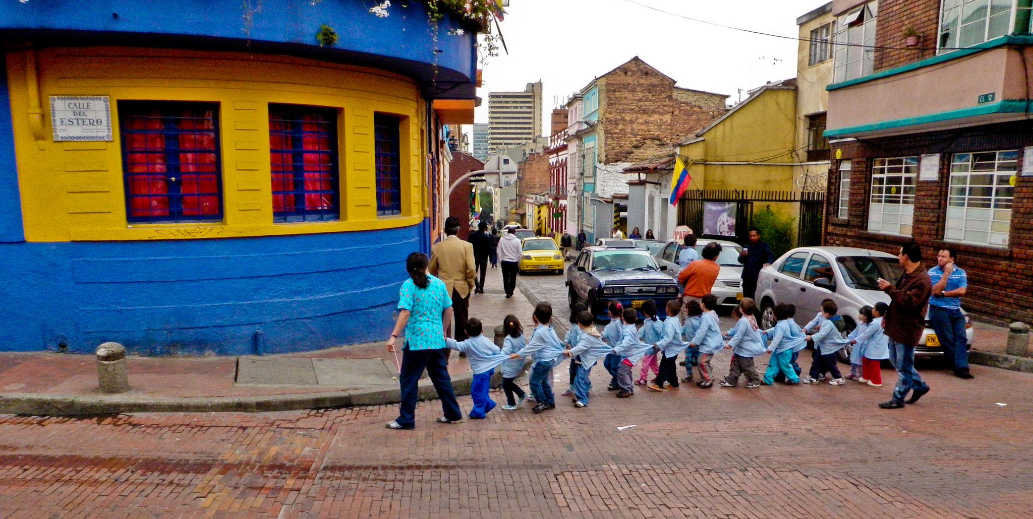 Small Children Crossing the Street in Bogota